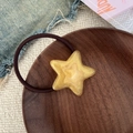 Elastic hair tie with coffee brown band and a glittering yellow resin star charm - Star Shape (Gold Hair Tie) / Gold Hair Tie