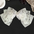 Elegant white chiffon layered bow hair clip featuring ink floral pattern on black background - Large Bow Hair Clip / Cyan