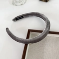 Detail of grey velvet padded headband with hand made label and silver charm accent - Premium Gray