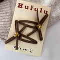 Set of two brown suede heart bow hair clips on grey knitted background for winter - BB Clips / Light Coffee