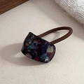 Detailed close-up of marble pattern acetate hair tie with high-elasticity brown rope - Deep Color Blue Dreamy Marble Style