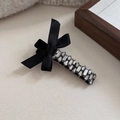 Elegant black bow hair clip with luxury rhinestones and pearls for women in a side view - Rectangular Bar Rhinestone Bowknot Style