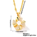 Detailed view of rotating windmill pendant with white pearl and micro-inlaid zircons - Gold Windmill Style (N01084-1)