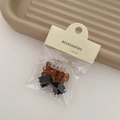 Set di 6 mini mollette per capelli in plastica nero, ambra e trasparente su cartoncino - Tartarugato 3