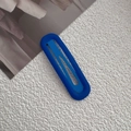 Minimalist navy blue matte snap hair clip with a classic oval metallic design - Klein Blue