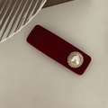 Close-up of a burgundy velvet hair clip with a pearl and gold bead floral detail - Pearl Style