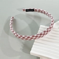 Detailed view of pink and white checkered fabric headband with handmade woven label - Pink Plaid