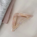 Pink marble acetate triangle hair claw clip with gold spring on a stylish cafe background - Pearl White