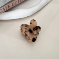 Detail of leopard print flower hair claw clip with elegant French resin texture finish - Light Tortoiseshell