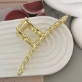 Pinza para el pelo minimalista en metal dorado con textura de lava y muelle elástico - Dorado / Brillante