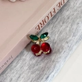 Mini pince à cheveux cerise avec cristaux rouges et verts sur socle doré - Rouge