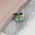 Elegante pinza de cereza con gemas azul claro y hojas verdes con acabado dorado - verde claro
