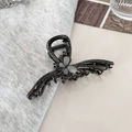 Elegant metal butterfly hair claw clip with grey opal stones in dark gunmetal finish - Black