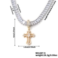 Detailed view of gold plated cross pendant necklace featuring baguette cut cubic zirconia - Luxury Center Stone Cross Style (N01287-5)