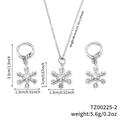 Detail view of silver snowflake jewelry set with cubic zirconia stones and measurements - Silver