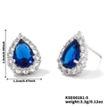 Detail van zilveren druppeloorbellen met blauwe zirkoon en micro-ingelegde kristallen - Diepblauw Stijl (KSE00281-5)