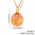 Pink Russian style egg pendant necklace with gold patterns and sizing specifications - Pink