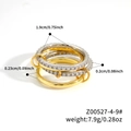 Set di tre anelli intrecciati in oro e argento con pavé di zirconi di alta qualità - Quattro Anelli Taglia 8
