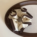 Brown bordered cream scrunchie with floral petal ruffles on a wooden tray - Coffee Edge Beige