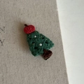 Detailed macro shot of a handmade crochet Christmas tree hair clip with pearl beads - Green Christmas Tree Red Apple Clip (9#)