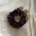 Detail of dark burgundy faux leather scrunchie with pleated texture on white knit background - Wine Red (2# Wine Red PU Scrunchie)