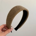 Close-up of wide brown woolen fabric headband with non-slip black inner lining - Milk Tea Fuzzy Headband