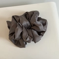 Deep grey oversized soft satin scrunchie with a glossy silk texture and rich folds - Gray Satin