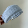 Macro shot of the light blue knitted wide headband with detailed woven texture - 4cm Wide / Light Blue Knitted Style