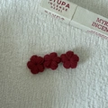 Detail of handcrafted burgundy crochet floral hair clips with soft knit textures - Triple Flower Design (5924710916534) / Burgundy