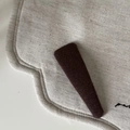 Close-up of vintage reddish-brown knitted fabric hair clip with detailed woven texture - Long Triangle Hair Clip / Khaki