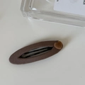 Close-up of a brown fabric-wrapped hair clip with a small flocked heart detail - Coffee Oval Hair Clip Milk Tea Heart (3#)