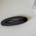 Detail view of a grey tweed BB hair clip featuring a black heart accent on white background - Gray Oval Hair Clip Black Heart (4#)