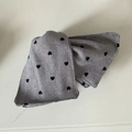 Detail of grey houndstooth fabric headband with black velvet heart patterns texture - Gray Triangle Black Heart Claw Clip