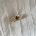 Vintage acetate bow hair clip with white marble texture and sparkling rhinestone accents - Creamy White Textured Style
