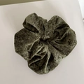 Velvet scrunchie in deep olive green color with elegant pleated texture and elastic core - Green Flocked Hair Tie