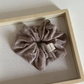 Vintage brown knitted fabric scrunchie with hand made label on a wooden tray - Milk Tea Striped
