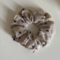 Detail of oatmeal fabric scrunchie with colorful heart pattern and white lace edging - 10# Milk Tea Dot White Edge Scrunchie