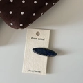 Oval denim texture hair claw with yellow stitching on white card display - Denim Acrylic Oval Hair Clip