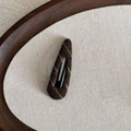 Detailed macro view showing the knitted texture and yellow stripes on the brown BB hair clip - Water Drop Hair Clip / Coffee and Yellow Stripes
