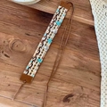 Bohemian braided hairband with star accents and seashells on natural wooden background - Shell Five-pointed Star