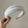Detail showing the thick knitted texture and soft padding of the wide mint green headband - Blue Striped Headband