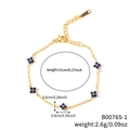 Elegant gold chain bracelet featuring five blue zircon floral charms with adjustable clasp - Gold Chain Blue Flower (B00765-1)