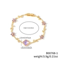 Zartes goldfarbenes Rankenarmband mit lila Zirkonia-Blumen und Kleeblatt-Edelstein - Lila Blume Goldener Zweig (B00768-1)