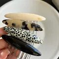 Set of four tortoiseshell and solid color hair combs with metallic silver teeth - White Curved Hair Comb