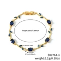 Pulsera de rama dorada con circonitas azules ovales y especificación de 18 cm de largo - Dorado + Azul Oscuro (B00764-1)