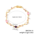 Goldenes Armband mit rosa und lila Zirkonia-Steinen in Blattform, 18 cm lang - Gold + Mehrfarbig (B00764-11)