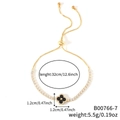 Bracciale placcato oro regolabile con trifoglio nero e pietre di cristallo di zircone - Trifoglio Oro con Centro Nero (B00766-7)
