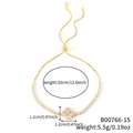 Bracciale a quadrifoglio dorato regolabile con pavé di zirconi e finitura lucida - Stile Quadrifoglio Interamente in Strass Oro (B00766-15)