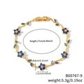 Elegante pulsera dorada con motivos de vid, flores de circón azul y cierre de metal seguro - Estilo de Flor Azul Claro y Estrás Transparente en Tono Dorado (B00767-9)