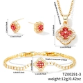 Three-piece jewelry set with red clover pendants, necklace, bracelet and stud earrings - Gold Red Zirconia Style (TZ00291-3)